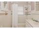Bathroom features a shower with curtain and sink at 341 Barton Ave, Indianapolis, IN 46241