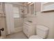 Bathroom features a shower with curtain and toilet at 341 Barton Ave, Indianapolis, IN 46241