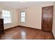 Bedroom with hardwood floors and a window for natural light at 341 Barton Ave, Indianapolis, IN 46241