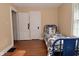 Bedroom includes hardwood floors, and natural light from the window at 341 Barton Ave, Indianapolis, IN 46241