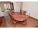 Inviting dining room featuring a wooden table with chairs, wood floor, and natural light at 341 Barton Ave, Indianapolis, IN 46241