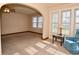 Bright living room featuring neutral walls and carpet, and multiple windows that let in lots of light at 341 Barton Ave, Indianapolis, IN 46241