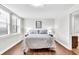 Comfortable bedroom offering a serene and inviting space for relaxation, featuring large windows at 350 N Meridian St # 705, Indianapolis, IN 46204