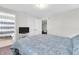 A cozy bedroom that features modern decor and a full bathroom at 350 N Meridian St # 705, Indianapolis, IN 46204