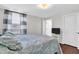 Comfortable bedroom features a window and light gray walls at 350 N Meridian St # 705, Indianapolis, IN 46204