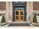 Elaborate bronze, stone, and wood entrance to the Indianapolis Athletic Club at 350 N Meridian St # 705, Indianapolis, IN 46204