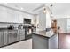 Modern kitchen featuring stainless steel appliances, granite countertops, and white cabinets at 350 N Meridian St # 705, Indianapolis, IN 46204