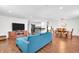 Bright, open-concept living room seamlessly flows into kitchen and dining area, perfect for entertaining at 350 N Meridian St # 705, Indianapolis, IN 46204