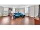 Bright living room featuring wood floors, and comfortable blue sofa at 350 N Meridian St # 705, Indianapolis, IN 46204