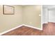 Picture of a corner of a room with tan walls and wood flooring at 350 N Meridian St # 705, Indianapolis, IN 46204
