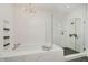 Modern bathroom with soaking tub, glass shower, and a sleek, minimalist design at 3713 Cherwell Dr, Zionsville, IN 46077