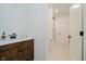Well-lit bathroom featuring a wood vanity with a white countertop and a shower/tub combo at 3713 Cherwell Dr, Zionsville, IN 46077