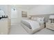 Tastefully decorated bedroom with neutral colors, a padded headboard, and modern furniture at 3713 Cherwell Dr, Zionsville, IN 46077