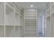 Spacious walk-in closet with custom shelving and ample storage space at 3713 Cherwell Dr, Zionsville, IN 46077