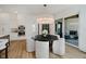 An elegant dining area showcases a round table with white chairs and modern lighting at 3713 Cherwell Dr, Zionsville, IN 46077