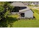 Modern home featuring a covered patio, professional landscaping, and a manicured lawn at 3713 Cherwell Dr, Zionsville, IN 46077