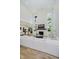Bright living room featuring tall ceilings, fireplace, and seamless flow at 3713 Cherwell Dr, Zionsville, IN 46077
