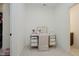 Chic vanity area with a mirrored desk, stylish chair, and plenty of storage space at 3713 Cherwell Dr, Zionsville, IN 46077