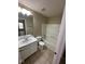 Bright bathroom with a clean white vanity, toilet, and a shower-tub combination at 3861 Candle Berry Dr, Indianapolis, IN 46235