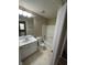 Cozy bathroom showcasing a modern mirror, white vanity, and shower-tub combo at 3861 Candle Berry Dr, Indianapolis, IN 46235