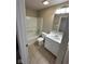 Clean bathroom featuring a shower-tub combo, toilet, and vanity with updated fixtures at 3861 Candle Berry Dr, Indianapolis, IN 46235