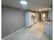Spacious kitchen featuring white cabinets and marble-like tile floors at 3861 Candle Berry Dr, Indianapolis, IN 46235