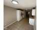 Spacious kitchen with white cabinets, tile floor, modern fixtures, and plenty of storage at 3861 Candle Berry Dr, Indianapolis, IN 46235