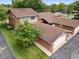 Aerial view of the charming brick home showing the roof and backyard at 3975 Offshore Dr, Columbus, IN 47203