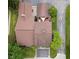Aerial perspective of roof, landscaping and outdoor patio with seating under shade at 3975 Offshore Dr, Columbus, IN 47203