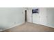 Simple bedroom with neutral carpet, light walls, and standard closet doors for a clean, functional space at 3975 Offshore Dr, Columbus, IN 47203