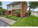 Charming brick home with a cozy balcony and well-maintained landscaping at 3975 Offshore Dr, Columbus, IN 47203