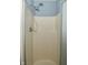 Enclosed shower with shower head and glass door at 4029 Gamay Ln, Indianapolis, IN 46254