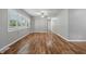 Bright living room showcasing hardwood floors, neutral walls, and ample natural light, creating a welcoming atmosphere at 420 Vista Dr, Carmel, IN 46280