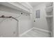 Storage room featuring utility shelves, neutral paint, and wood look flooring at 420 Vista Dr, Carmel, IN 46280