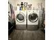 Laundry room featuring a washer, dryer, and shelving for storage at 4209 Switchgrass Way, Indianapolis, IN 46237