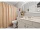 This is a bathroom with a shower and vanity with a mirror at 4736 Rocky Knob Ln, Indianapolis, IN 46254