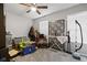 This is a carpeted room with an ironing board and items on the floor at 4736 Rocky Knob Ln, Indianapolis, IN 46254