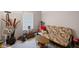 This is a carpeted room with a futon and pillows at 4736 Rocky Knob Ln, Indianapolis, IN 46254