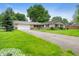 Charming ranch home with a two-car garage and a long driveway at 4904 N Tillotson Ave, Muncie, IN 47304