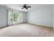Living room offers great natural light from the large picture window at 4904 N Tillotson Ave, Muncie, IN 47304