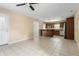 Open concept living room with breakfast bar and direct kitchen access at 4904 N Tillotson Ave, Muncie, IN 47304