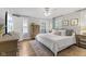 This bedroom offers hardwood floors, natural light, and neutral colors at 519 Woodruff Place Middle Dr, Indianapolis, IN 46201