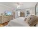 This bedroom features hardwood floors, natural light, and neutral colors at 519 Woodruff Place Middle Dr, Indianapolis, IN 46201