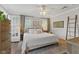 This cozy bedroom features hardwood floors and soft, neutral decor at 519 Woodruff Place Middle Dr, Indianapolis, IN 46201