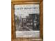 Framed historic newspaper ad for home's builder at 519 Woodruff Place Middle Dr, Indianapolis, IN 46201