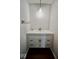 Bathroom sink with cabinet, drawers, and modern faucet at 5331 Birch Ln, Greenwood, IN 46143