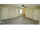Spacious bedroom with new grey carpet and closet, featuring natural light at 5331 Birch Ln, Greenwood, IN 46143
