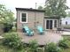 Well-kept backyard with a patio, lawn and exterior view of the house at 5348 Crittenden Ave, Indianapolis, IN 46220