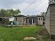Beautiful backyard with a patio, lawn, rear entry and detached garage at 5348 Crittenden Ave, Indianapolis, IN 46220