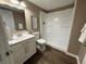 Clean bathroom featuring a white vanity, modern fixtures, and a bright shower and tub combination at 5348 Crittenden Ave, Indianapolis, IN 46220